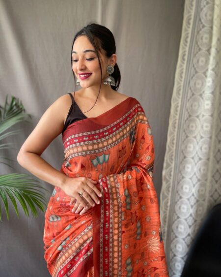 Women's Artistic Terracotta Orange Linen Saree with Kalamkari Inspired Print & Tassel Detailing – Perfect for Casual Festivities & Cultural Events